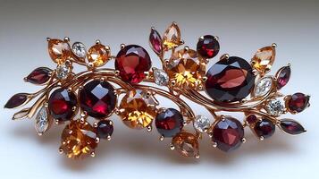 Garnet citrine brooch in an abstract flowing design closeup view highlighting the luminous stones against a white backdrop photo