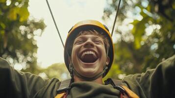 Young Man Enjoying an Exhilarating Zipline Adventure in Nature photo
