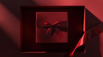 Top view of deep red gift box with satin ribbon, minimalist setup, perfect for special occasions photo