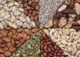 Nuts and seeds in a circle photo