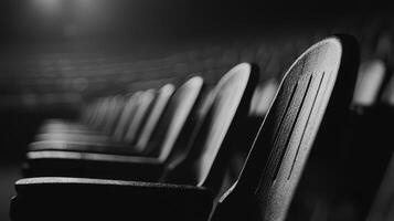 Empty Stadium Seats Rows of Black Plastic Chairs Monochrome Photography photo