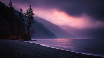 Serene Coastal Sunset Misty Mountains Dark Beach and Silhouetted Pines photo