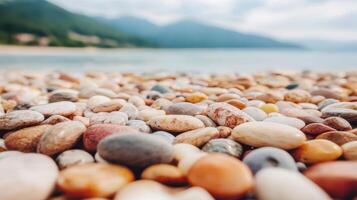 Colorful Smooth Sea Stones on Beach Coastal Rocks Background Ocean View photo