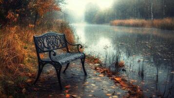 Serene Autumnal Park Scene Ornate Bench by Misty Lake Fallen Leaves photo