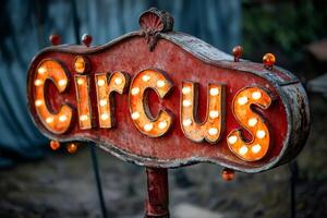 Illuminated circus sign displaying entertainment and excitement photo