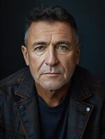 A close-up portrait of a man with a weathered face photo