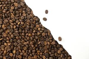 Coffee beans and ripped paper background. Copyspace for your text photo