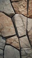 Natural rock textures in a minimalist vertical shot, with muted tones, establishing a calm and open feel. photo