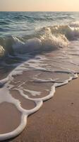 Close-up of vertical wave patterns on a quiet beach, featuring smooth textures and a clean background for text. photo