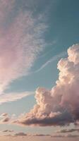 Vertical composition showcasing streaky clouds in soft pastel hues, with a clean design and open areas for text. photo