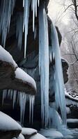 A vertical capture of a frozen waterfall adorned with detailed icicles, bathed in soft light, and framed by open space for text placement. photo