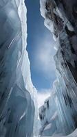 A high-resolution vertical shot of an ice-covered cliff, showcasing cascading ice formations with ample blank sky for copy placement. photo