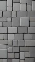 A vertical shot of gray stone tiles arranged in a linear fashion, with plenty of blank space for text overlays. photo