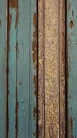 Close-up vertical shot of a weathered wooden shutter with peeling paint, providing textures and space for text overlays. photo