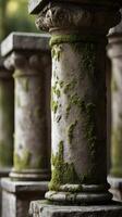 A vertical close-up of weathered stone columns with moss-covered textures, bathed in soft light, and ample negative space for text. photo