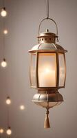 A tranquil vertical shot of a glowing lantern suspended against a blurred neutral backdrop, with open space for text. photo