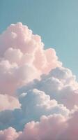A vertical view of soft cloud layers in a pastel-colored sky, creating a serene atmosphere with ample copy space. photo