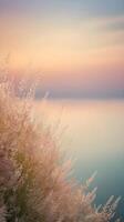 A smooth gradient blending delicate colors along the horizon, forming a serene vertical background. photo