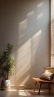 A quiet background of a textured wall with soft sunlight streaming through blinds, creating vertical shadow patterns with blank areas for copy space. photo