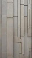 A vertical background of a textured concrete wall in muted tones, perfect for clean and minimalistic designs. photo