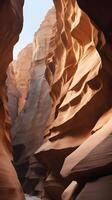 A high-detail vertical shot of a canyon wall featuring layered rock formations in warm tones, with a blank sky or smooth textures offering space for text. photo