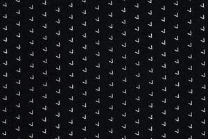 Black material with abstract pattern a background or texture photo