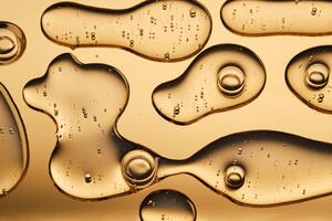 The beautiful texture of the cosmetic serum on a gold background that takes up most of the photo. photo