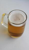 Full Glass Of Classic Lager Beer With Thin Layer Of Foam Stock Photo For Vertical Story
