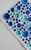 Paper Sheet With Self Adhesive Rhinestones Variety Shades Of Blue photo