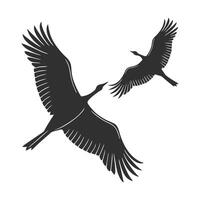 A striking silhouette of a raven in mid-flight, its wings outstretched. vector