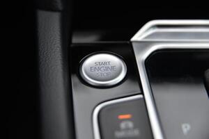 Close up of a car's push button start engine ignition system photo