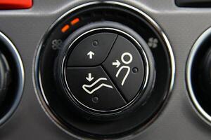 Close up of car seat adjustment controls Easy to use buttons for seat height and lumbar support photo