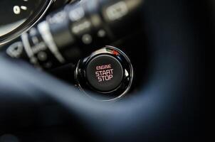 Close up of a car's engine start button Modern automotive technology photo