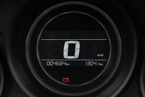 Close up of a car's digital speedometer displaying zero speed Odometer shows mileage photo