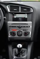Modern car interior dashboard with digital display and climate controls photo