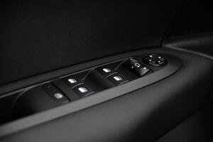 Close up of car's power window and lock controls photo
