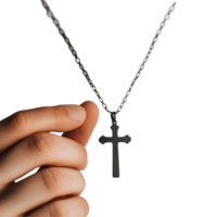 Hand holding a Christian cross necklace against a transparent background in a serene indoor setting, Hand Holding a Christian Cross Necklace on transparent background png