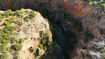 Aerial View of Canyon with Clear Turquoise Waters on Sunny Day video