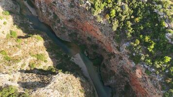 Aerial View of Canyon with Stunning Turquoise Waters on Clear Day video