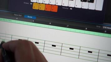 Close up, Writing music notes with a music composer application using a touch screen tablet pen video