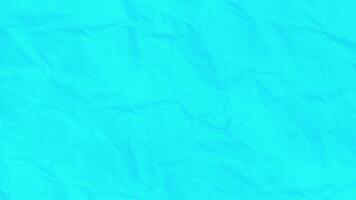 Abstract art background animation blue color crumpled paper. Stop motion animated paper texture background. Crumpled neon blue Paper 4k. video