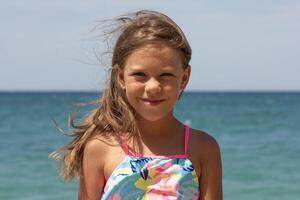 Portrait of beautiful girl of 7-8 years photo