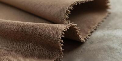 Textured Brown Canvas Fabric with Woven Design for Rustic Backdrop photo
