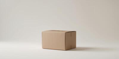 Closed brown cardboard box on a light background with copy space for branding or text photo