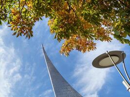 A rocket against the background of clouds in the autumn sky. Moscow. photo