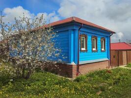 Blue painted wooden house. photo