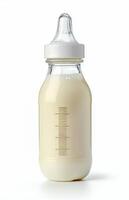 Clear glass baby bottle filled with milk ready for feeding time in a cozy nursery atmosphere photo