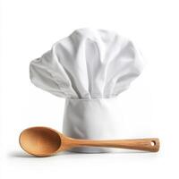 Chef hat and wooden spoon arranged on a clean white background for culinary inspiration photo