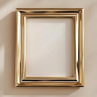 Elegant gold picture frame ready for artwork or photographs in a minimalistic interior decor setting photo