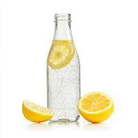 Refreshing lemon-infused sparkling water in a glass bottle with sliced lemons on a white background photo